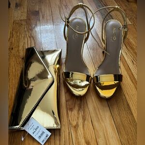 Aldo Kat
Strappy heel and matching Gold Clutch